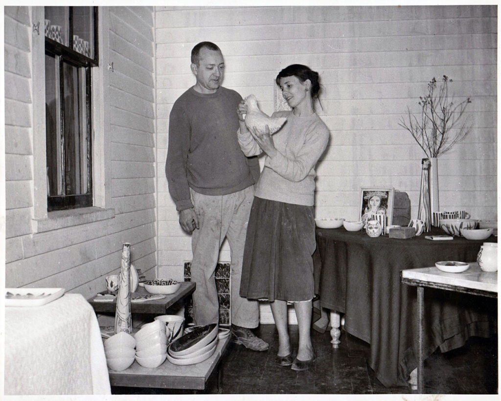 Weston and Brenda Andersen, founders of Andersen Design, holding the mold of their first wildlife sculpture, the Floating Gull